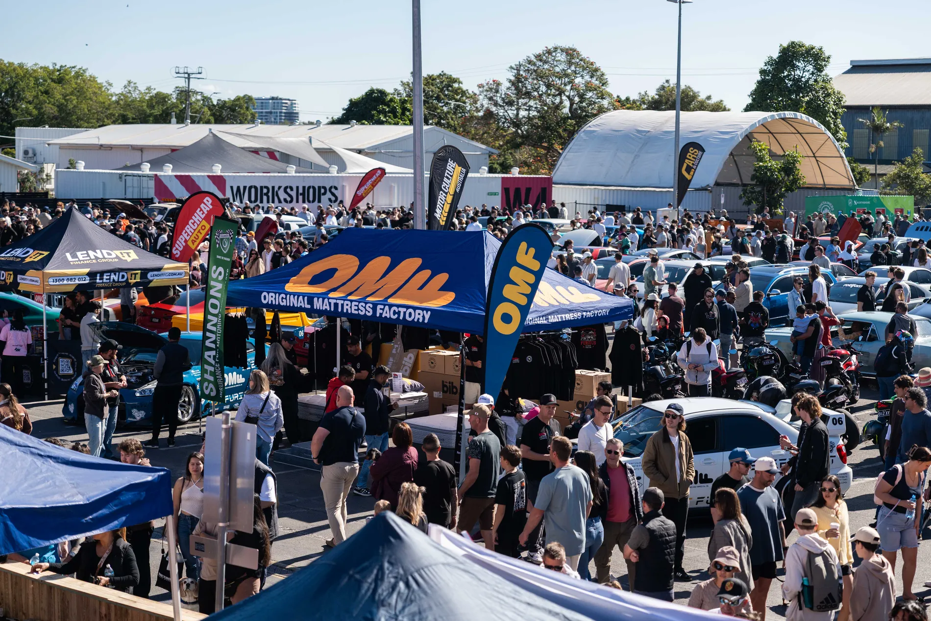 Brand activations and crowds at an MCA Cars & Culture event