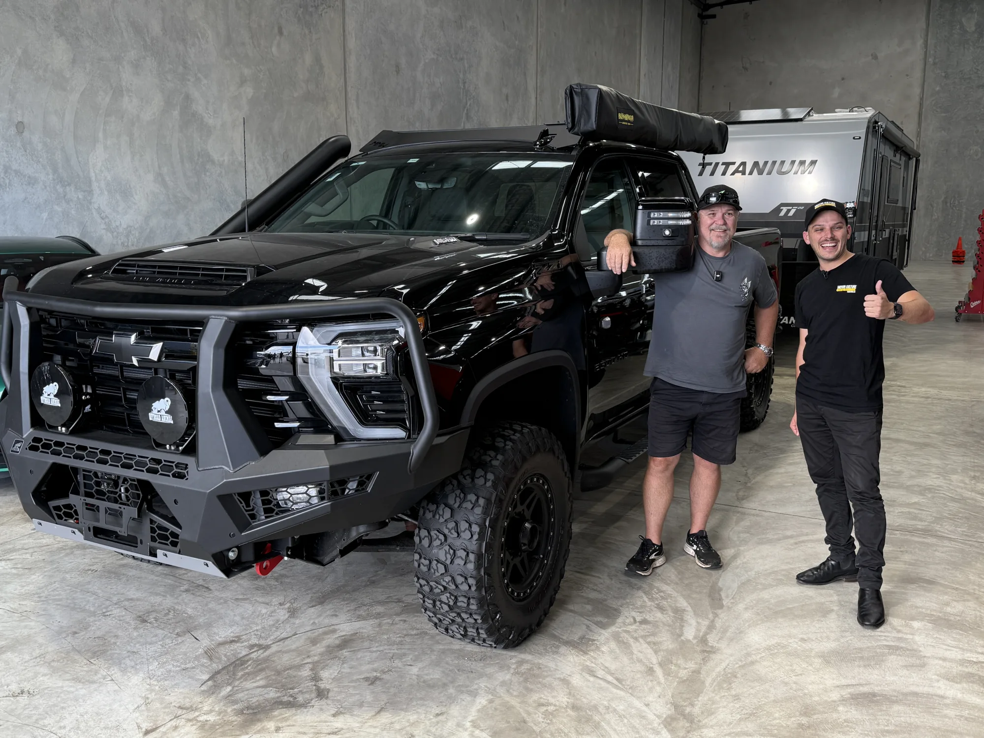 Luke Gardner with his Chevrolet Silverado and caravan at the MCA handover