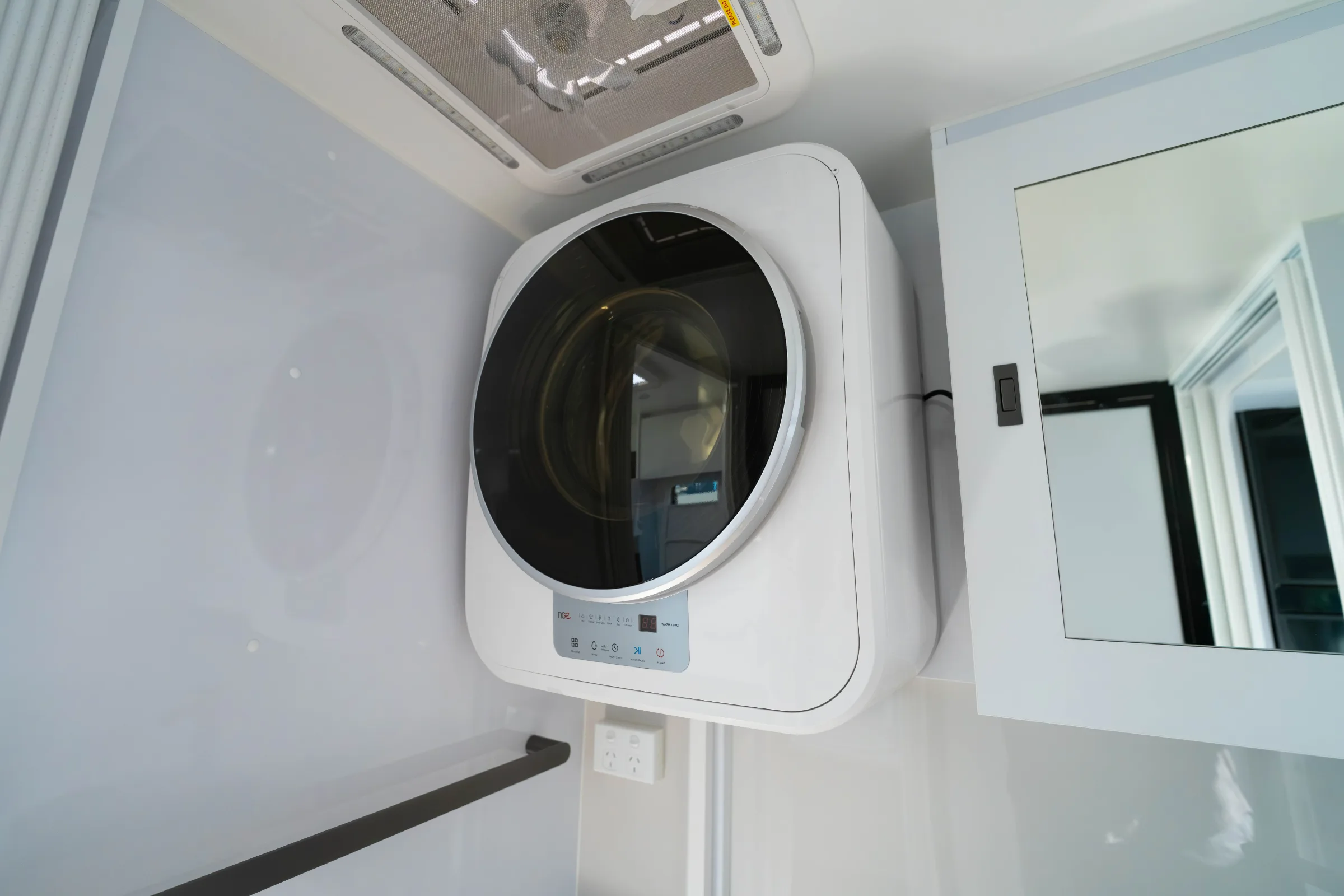 Full bathroom with washing machine